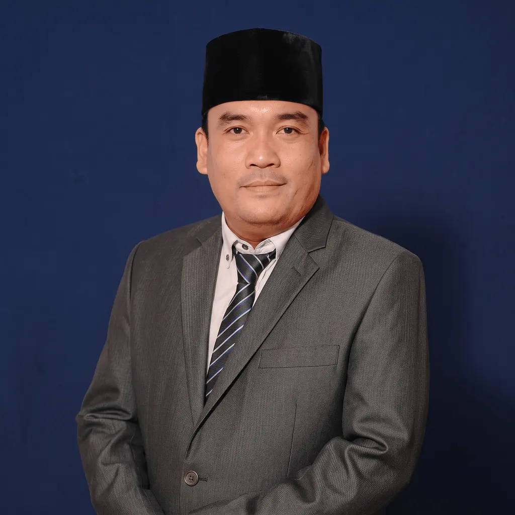 Dr. Husni Mubarok, M.Pd